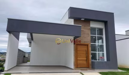 Casa com 3 dormitórios à venda, 130 m² por R$ 900.000 - Condominio Cataguá Way - Taubaté/SP