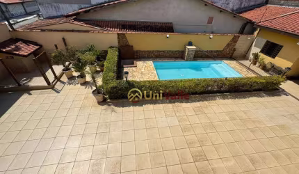 Casa com 4 dormitórios à venda, 349 m² por R$ 820.000,00 - Parque São Cristóvão - Taubaté/SP