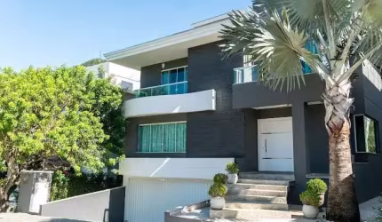 Luxuosa mansão à venda em condomínio exclusivo na Praia do Estaleiro, Balneário Camboriú-SC: 5 quartos, 5 suítes, 3 salas, 6 banheiros, 4 vagas, 630m².