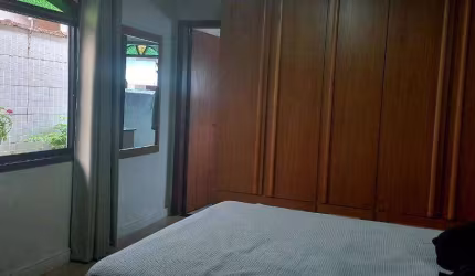 Casa com 3 dormitórios à venda, 270 m² por R$ 1.500.000,00 - Vila Guilhermina - Praia Grande/SP