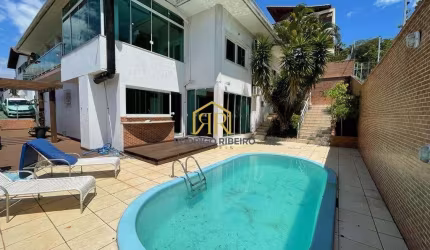 Casa em condomínio fechado com 4 quartos à venda na Rodovia Haroldo Soares Glavan, --, Cacupé, Florianópolis por R$ 2.450.000