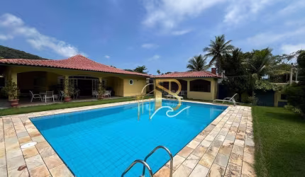 Casa com 5 dormitórios à venda, 390 m² por R$ 1.800.000,00 - Guaiuba - Guarujá/SP