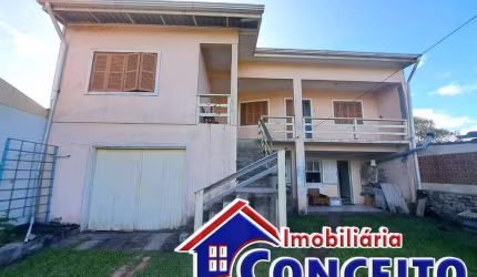 C394 - Ótimo sobrado com 02 apartamentos no balneário Albatroz
