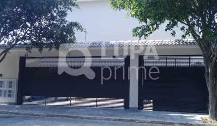 CASA 2 SUÍTES 2 VAGAS DE GARAGEM EM CONDOMÍNIO FECHADO - PALMAS DO TREMEMBÉ