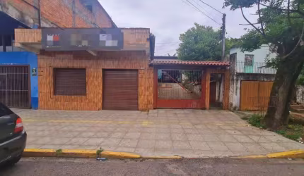 Casa com 3 dormitórios à venda, 220 m² por R$ 980.000,00 - Camboim - Sapucaia do Sul/RS