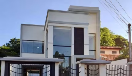 Sobrado com 3 dormitórios à venda, 308 m² por R$ 1.190.000,00 - Piratini - Sapucaia do Sul/RS