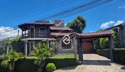 Sobrado com 3 dormitórios à venda, 250 m² por R$ 1.300.000,00 - Nossa Senhora das Graças - Canoas/RS