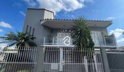Sobrado com 4 dormitórios à venda, 199 m² por R$ 860.000 - Niterói - Canoas/RS