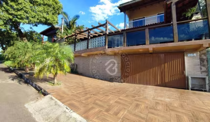 Casa com 4 dormitórios para alugar, 350 m² por R$ 5.070,00/mês - Camboim - Sapucaia do Sul/RS