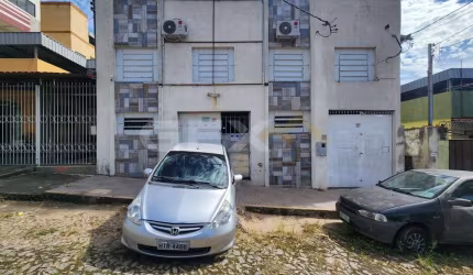 Terreno à venda de 300m² no bairro Planalto com Galpão e 2 sobrados de fundo.