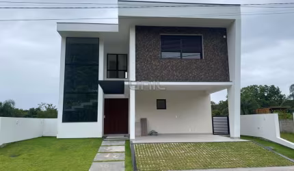 Casa em condomínio fechado com 3 quartos à venda na Rua das Goiabas, 2850, Vargem Grande, Florianópolis, 230 m2 por R$ 2.019.900