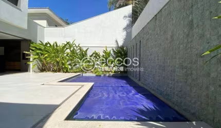 Casa em condomínio à venda, 4 quartos, 3 suítes, 6 vagas, Jardim Karaíba - Uberlândia/MG