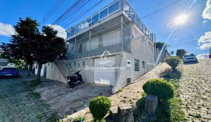 Casa com 3 quartos à venda na Rua Tucano, 505, Cruzeiro, Caxias do Sul por R$ 499.900