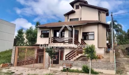 Casa com 3 quartos à venda na Doutor Luiz Mezzalira Filho, 459, Nossa Senhora da Saúde, Caxias do Sul por R$ 1.484.000