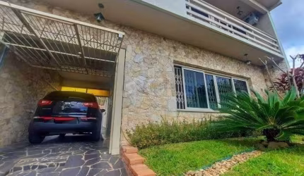 Excelente casa com 3 dormitórios e 3 vagas de garagem