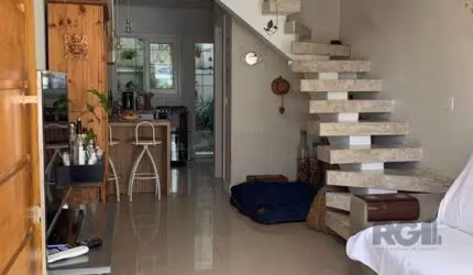 Casa em condomínio 69m² - 2 dormitórios suítes, 1 vaga no bairro Cavalhada