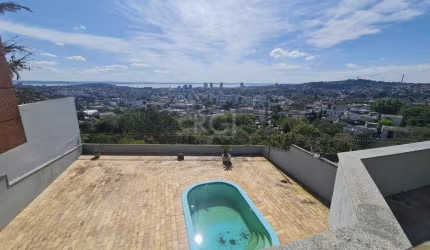 Casa para Venda - 464m², 5 dormitórios, sendo 4 suites, 4 vagas - Nonoai