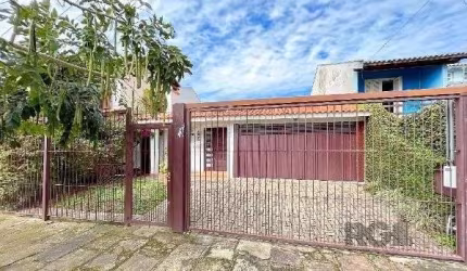 Casa em Porto Alegre, no bairro Guarujá, com 3 dormitório(s), à venda.