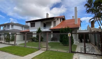 CASA EM ATLANTIDA COM 5 SUÍTES