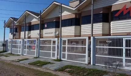 Sobrado em Trmandai com 2 suirtes, 2 banheiros, 1 vaga, churrasqueira e varanda.