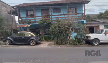 Casa com 3 quartos, vaga de garagem, churrasqueira, no bairro Partenon, Porto Alegre/RS