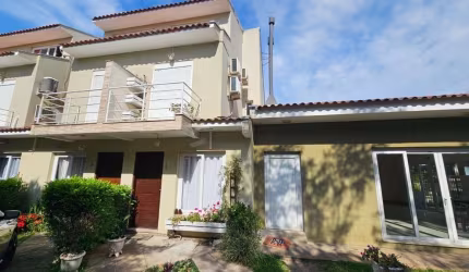 casa em condomínio com 2 dormitórios 1 suíte e sotão no bairro Hípica Porto Alegre - RS