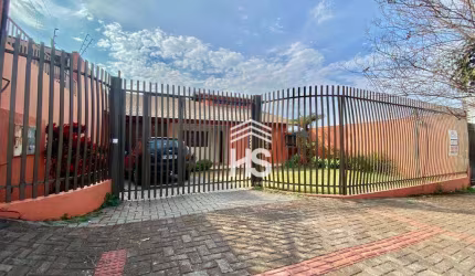Terreno com 2 benfeitorias no Centro