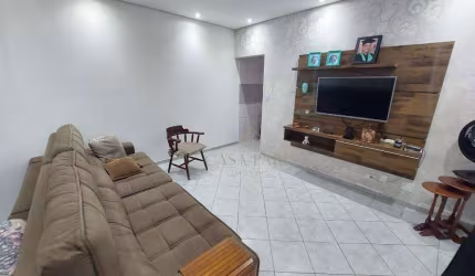 Casa com 3 dormitórios à venda, 100 m² por R$ 585.000,00 - Vila Assunção - Praia Grande/SP