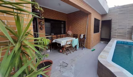 Casa com 4 dormitórios à venda, 162 m² por R$ 900.000,00 - Caiçara - Praia Grande/SP