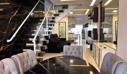 Sobrado com 3 dormitórios à venda, 125 m² por R$ 970.000,00 - Ocian - Praia Grande/SP