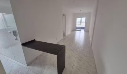 Apartamento com 2 dormitórios à venda, 65 m² por R$ 429.000,00 - Caiçara - Praia Grande/SP