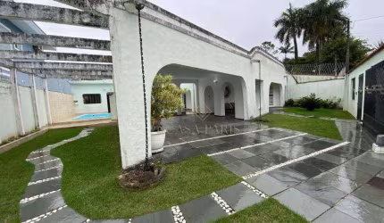 Casa mobiliada com piscina e 5 quartos à venda, 372 m² por R$ 1.300.000 - Solemar - Praia Grande/SP
