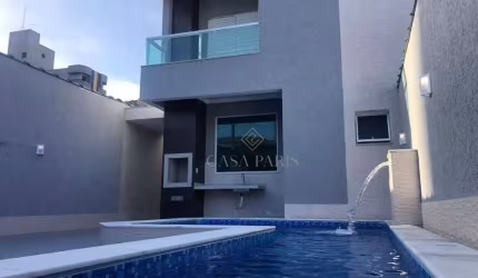 Sobrado com 3 dormitórios à venda, 135 m² por R$ 990.000,00 - Tupi - Praia Grande/SP