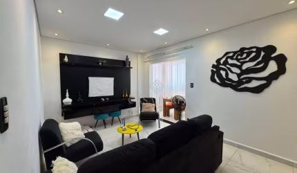 Apartamento com 2 dormitórios à venda, 65 m² por R$ 340.000,00 - Caiçara - Praia Grande/SP