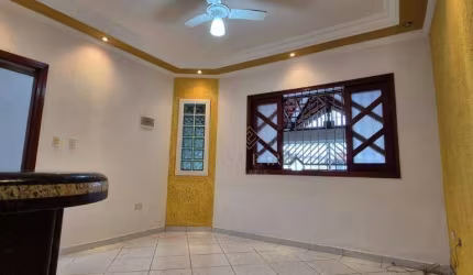 Casa com 2 dormitórios à venda, 70 m² por R$ 490.000,00 - Caiçara - Praia Grande/SP