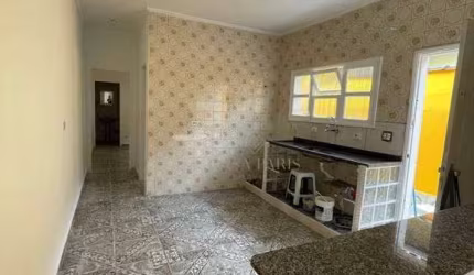 Casa com 2 dormitórios à venda, 82 m² por R$ 385.000,00 - Caiçara - Praia Grande/SP