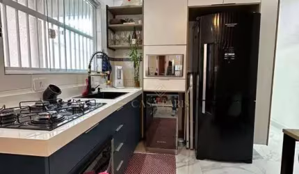 Casa com 3 dormitórios à venda, 113 m² por R$ 520.000,00 - Maracanã - Praia Grande/SP