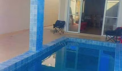 Casa com 2 dormitórios à venda, 110 m² por R$ 530.000,00 - Maracanã - Praia Grande/SP
