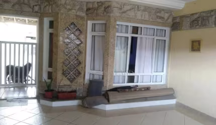 Sobrado com 3 dormitórios à venda, 135 m² por R$ 850.000 - Ocian - Praia Grande/SP