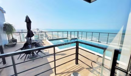 Apartamento com 2 dormitórios à venda, 70 m² por R$ 690.000,00 - Caiçara - Praia Grande/SP