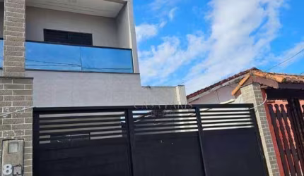 Sobrado com 3 dormitórios à venda, 100 m² por R$ 570.000,00 - Maracanã - Praia Grande/SP