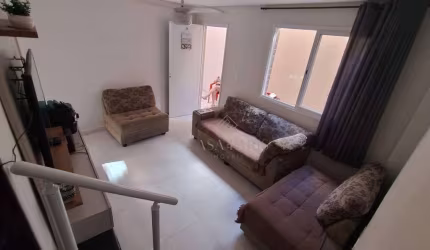 Casa com 2 dormitórios à venda, 59 m² por R$ 405.000,00 - Aviação - Praia Grande/SP