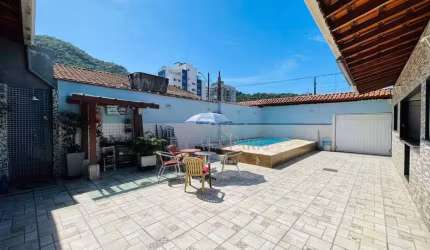 Casa com 3 dormitórios à venda, 166 m² por R$ 1.190.000,00 - Canto do Forte - Praia Grande/SP