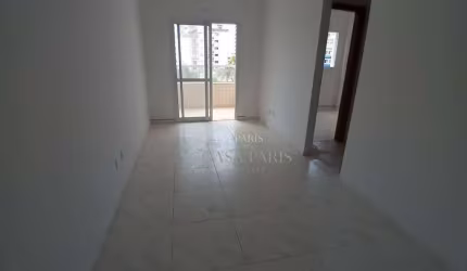 Apartamento com 2 dormitórios à venda, 53 m² por R$ 375.000,00 - Caiçara - Praia Grande/SP