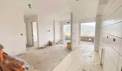 Apartamento com 2 dormitórios à venda, 57 m² por R$ 480.000,00 - Canto do Forte - Praia Grande/SP