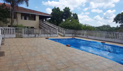 Vendo linda chácara com 6 suíte , pomar e 10 vagas de carro