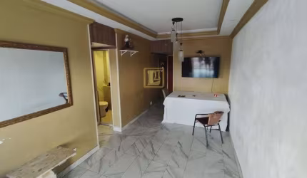 Apartamento de Dois Quartos com Suíte no Centro