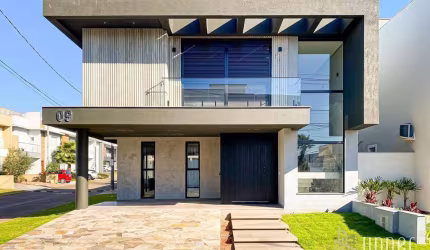 Casa com 3 dormitórios à venda, 220 m² por R$ 1.595.000,00 - Condomínio Villagio Piacenza - Cachoeirinha/RS