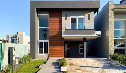 Casa com 3 dormitórios à venda, 180 m² por R$ 1.490.000,00 - Terras Alpha - Gravataí/RS
