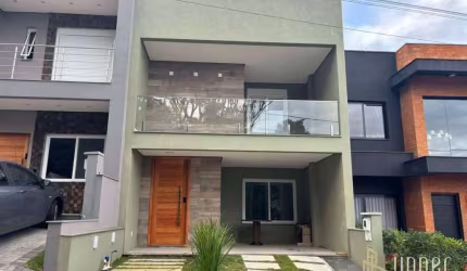 Casa com 3 dormitórios à venda, 200 m² por R$ 936.000,00 - Condomínio Primavera - Gravataí/RS